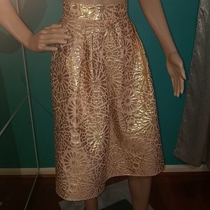 Eva Mendes gold metallic pink skirt